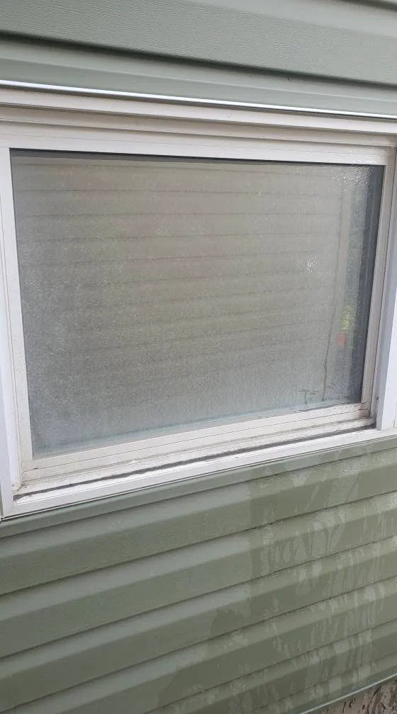 Hazy dirty window before cleaning